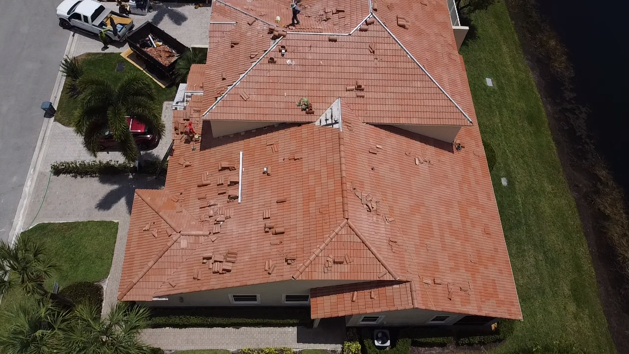 Tile roof replacement in progress on Treasure Coast home