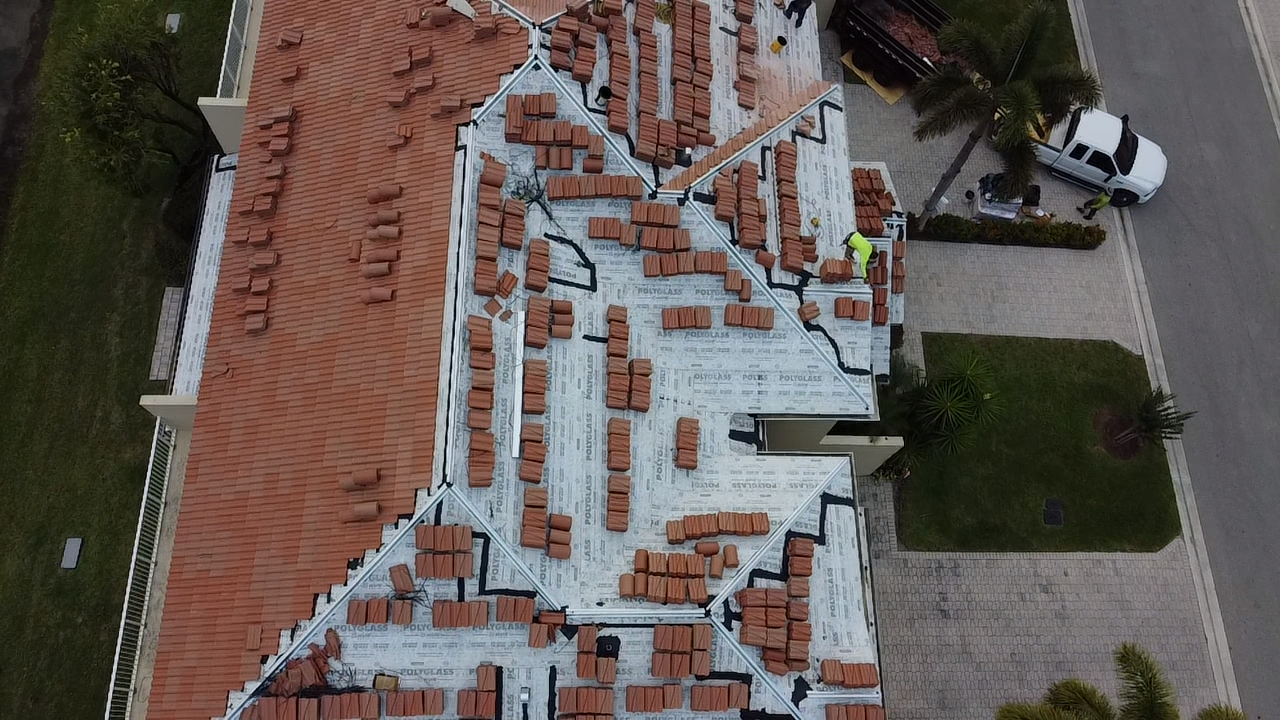 Underlayment and tile staging during roof replacement