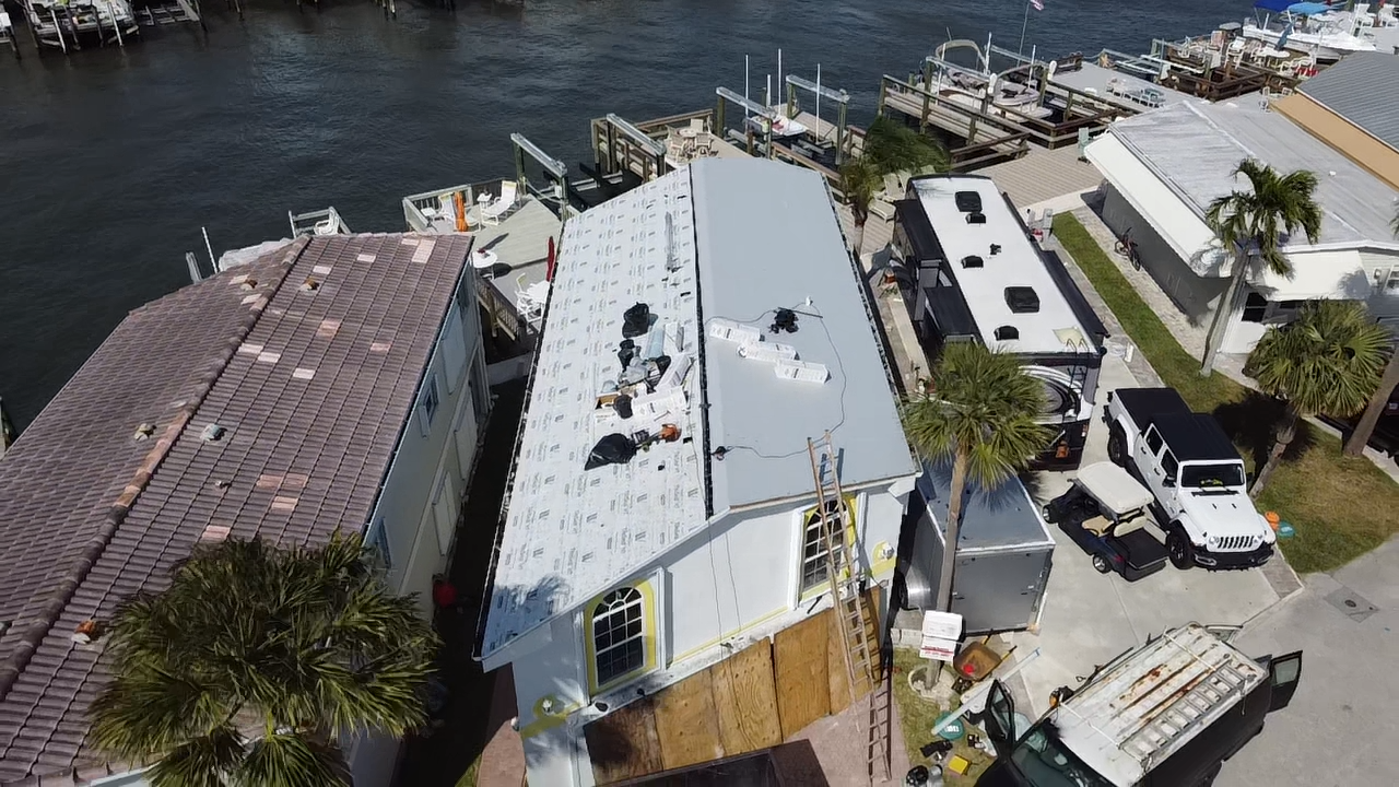Waterfront flat roof underlayment install in Jensen Beach