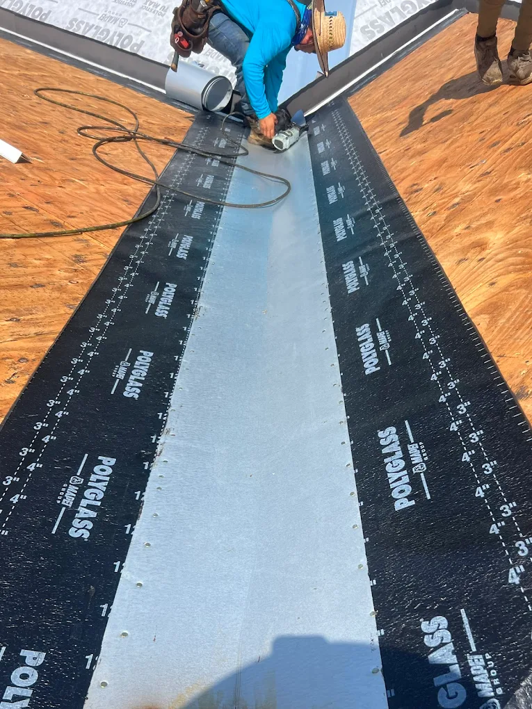 Polyglass underlayment installation detail by Rooftop Roofing crew