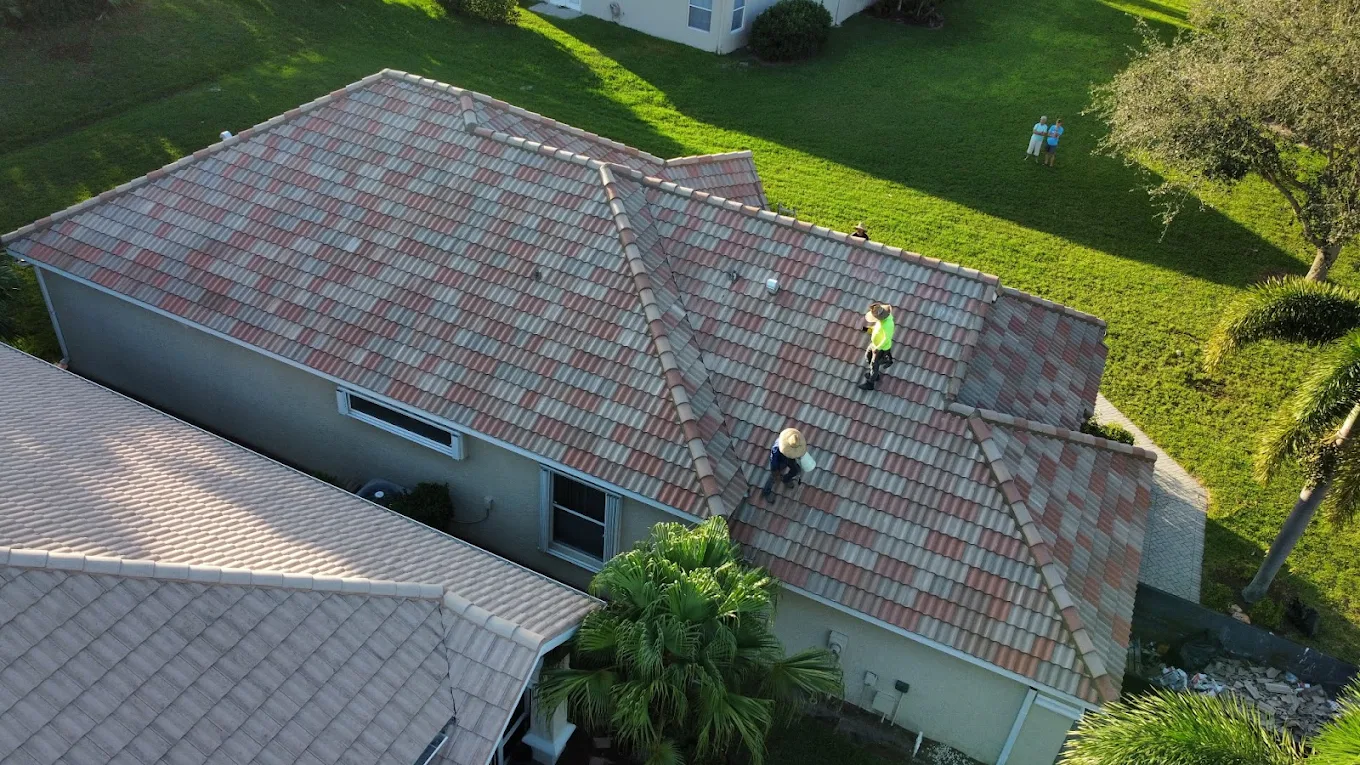 Aerial view of new multi-color tile roof on a Florida home